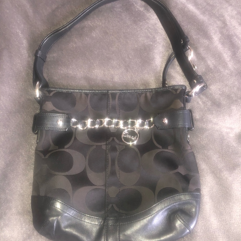 Authenic Coach signature purse. Adjustable strap!